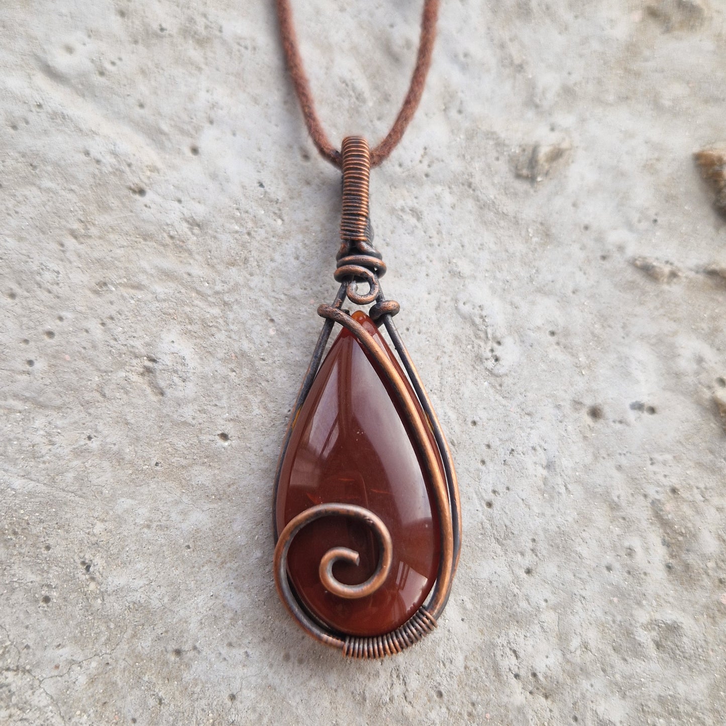 Copper wire wrapped teardrop carnelian crystal pendant for emotional support
