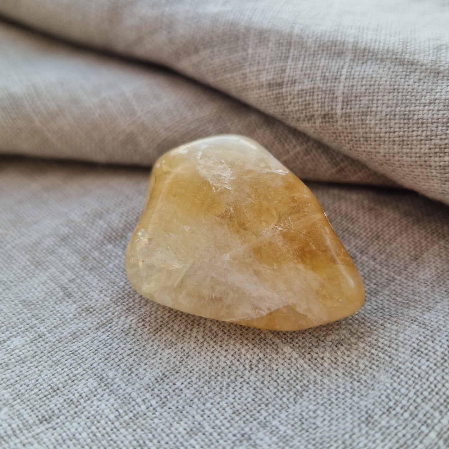 Citrine palm crystal for healing from grief