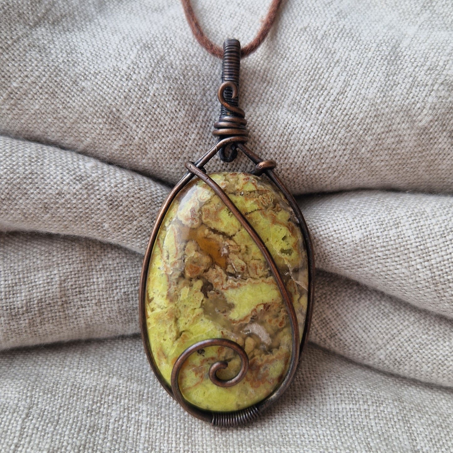 Close up of a frequency imprinted green opal crystal