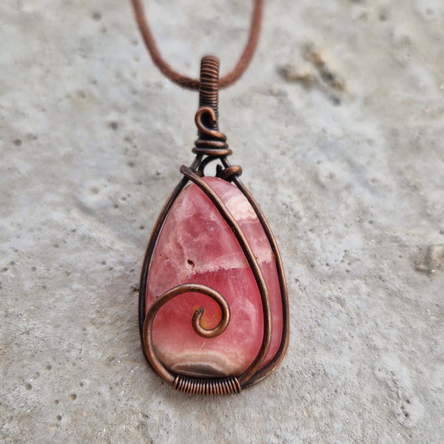 A pendant to help release the emotions of loss