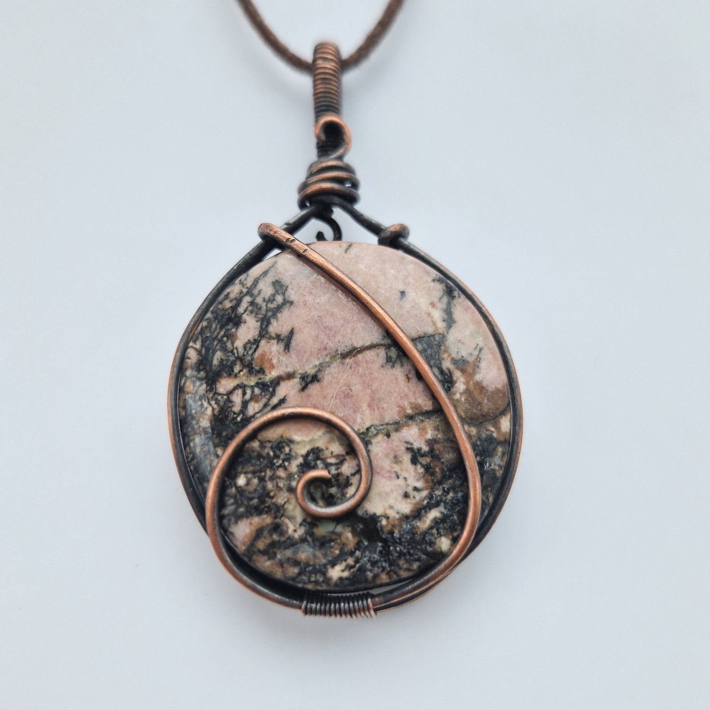 Rhodonite Crystal Pendant Wrapped in Copper Wire for emotional Healing