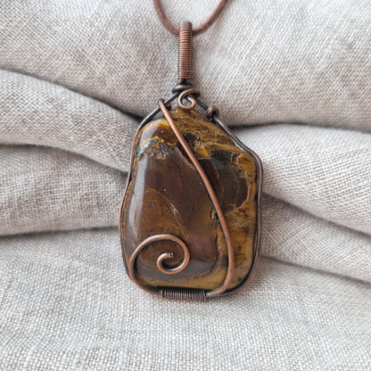 Tigers eye necklace imprinted with the life essence of a belated love one