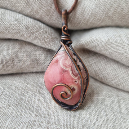 Copper wrapped rhodochrosite healing crystal