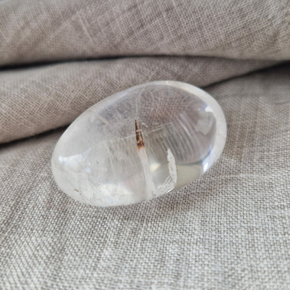 A clear quartz crystal for the palm or pocket to restore balance to the body and soul