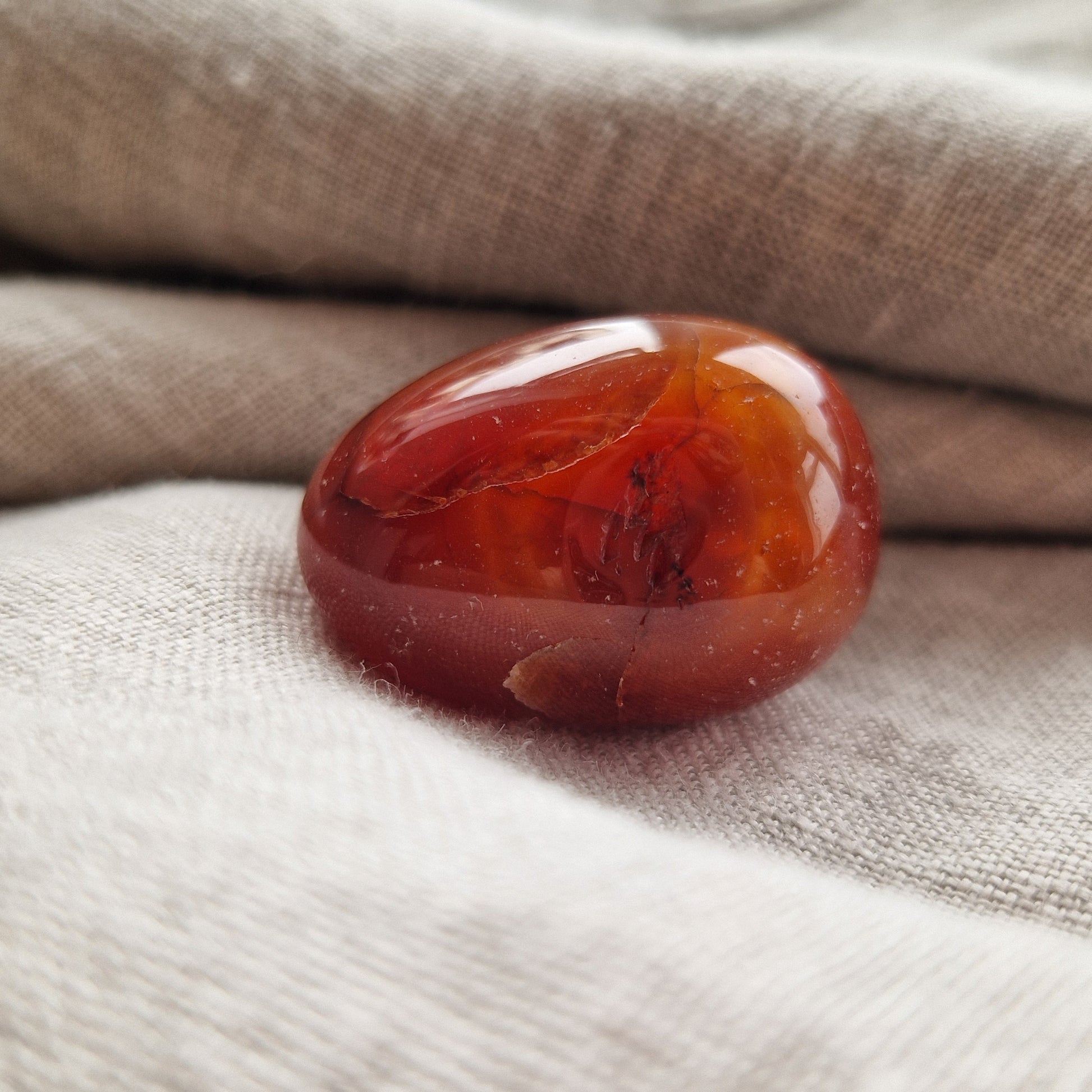 Carnelian palm crystal for grief support