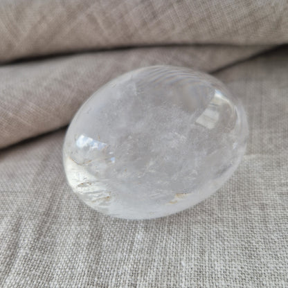 A clear quartz crystal for the palm or pocket to balance energies