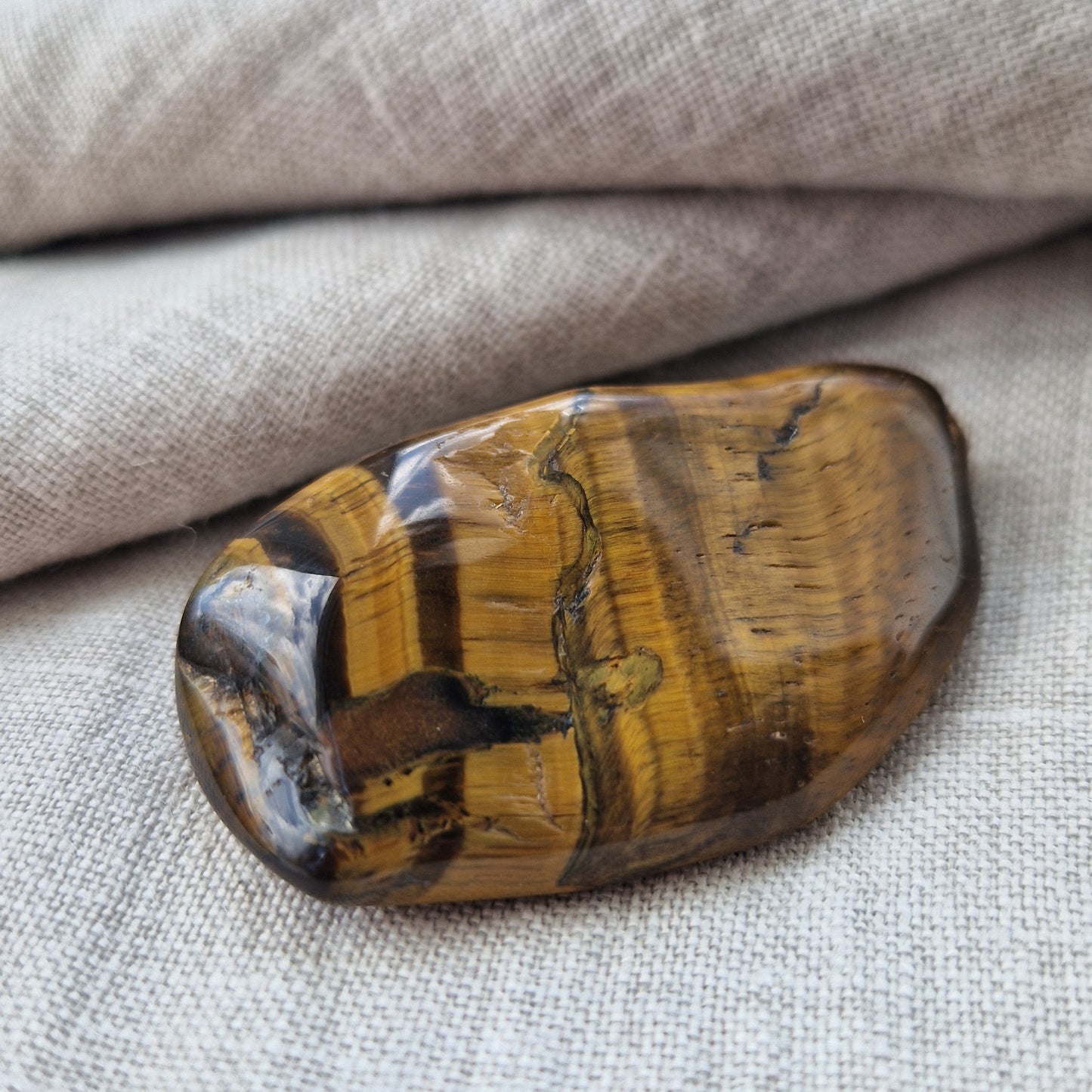 A stunning tigers eye crystal for healing, comfort and connection after loss