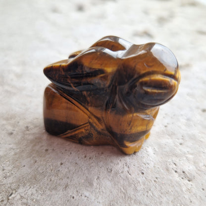 A tigers eye crystal rabbit imprinted with the energy pattern of you departed pet for healing and connection