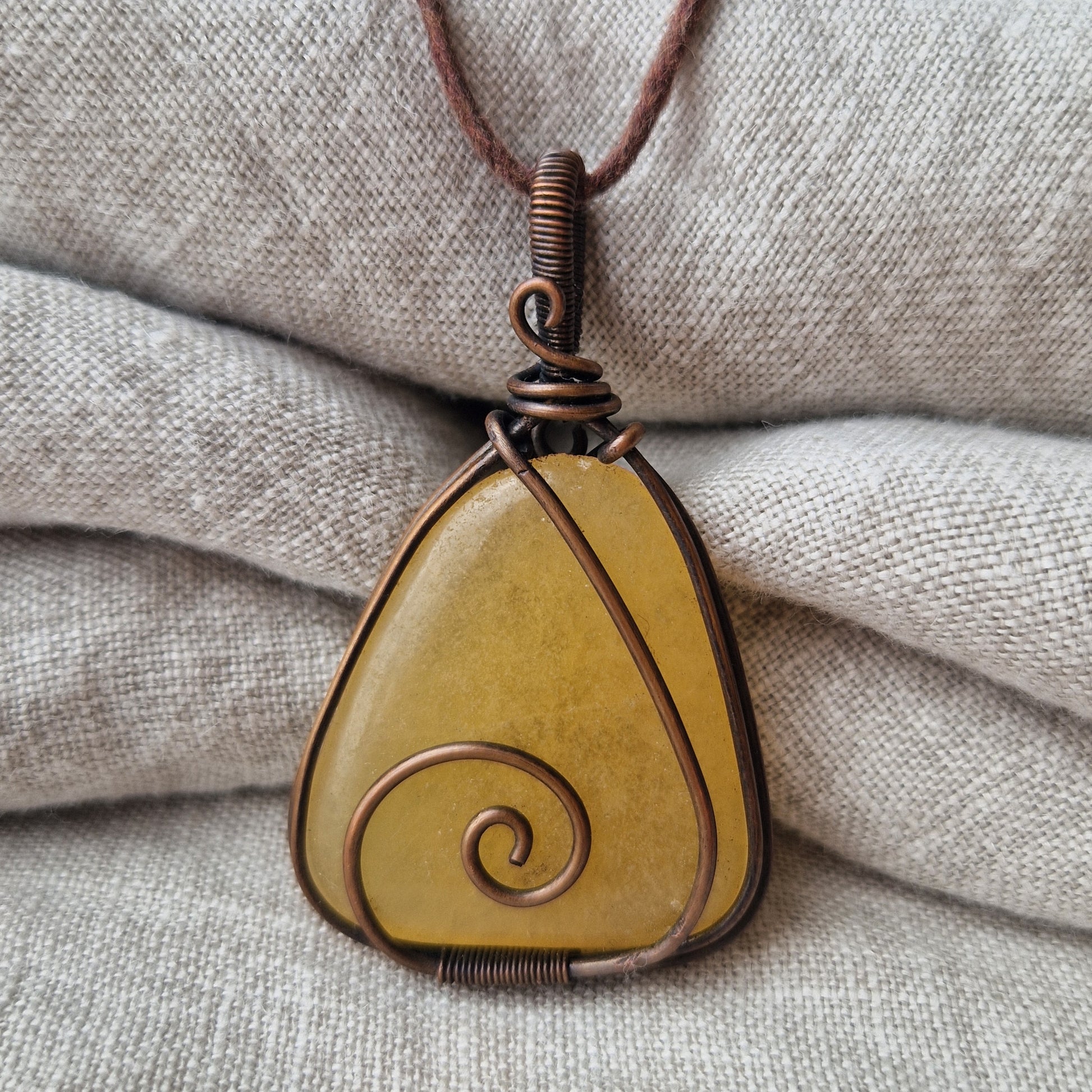 Orange calcite imprinted with the life essence of a elated loved one for healing