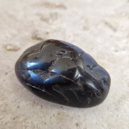 Black onyx palm crystal for grief support